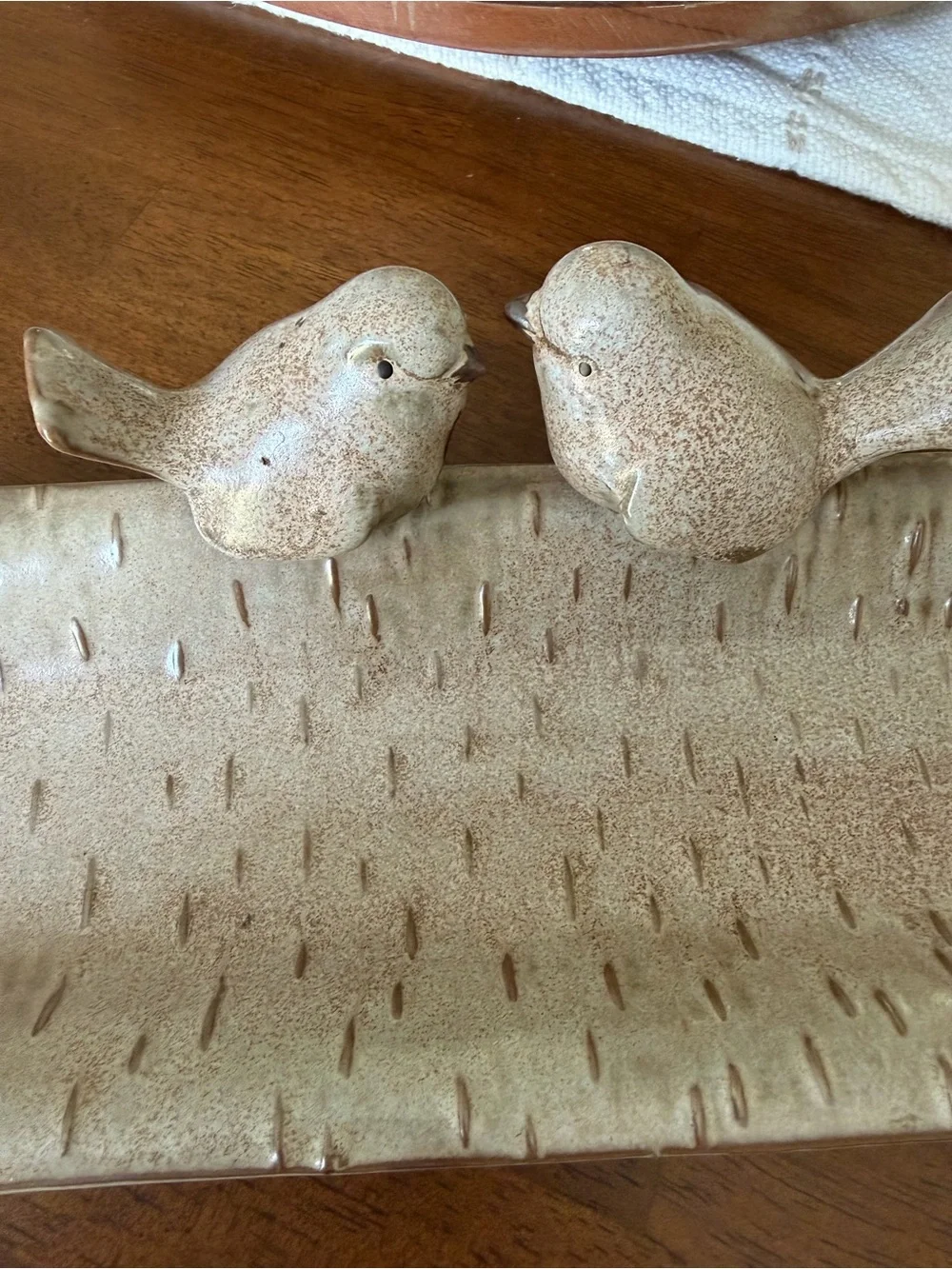 Ceramic bird feeder/tray.